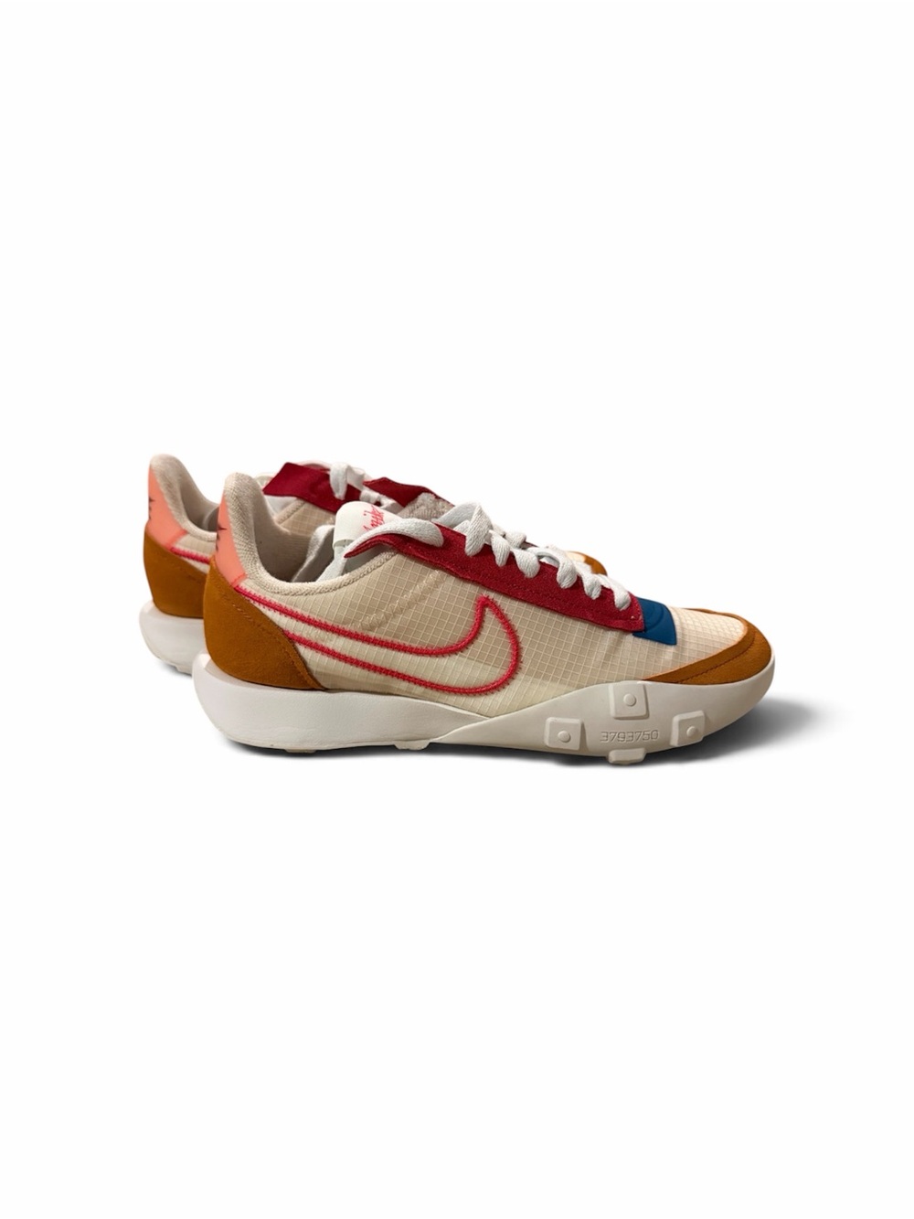 Nike Women’s Cream Sneakers with Red, Blue & Brown Accents